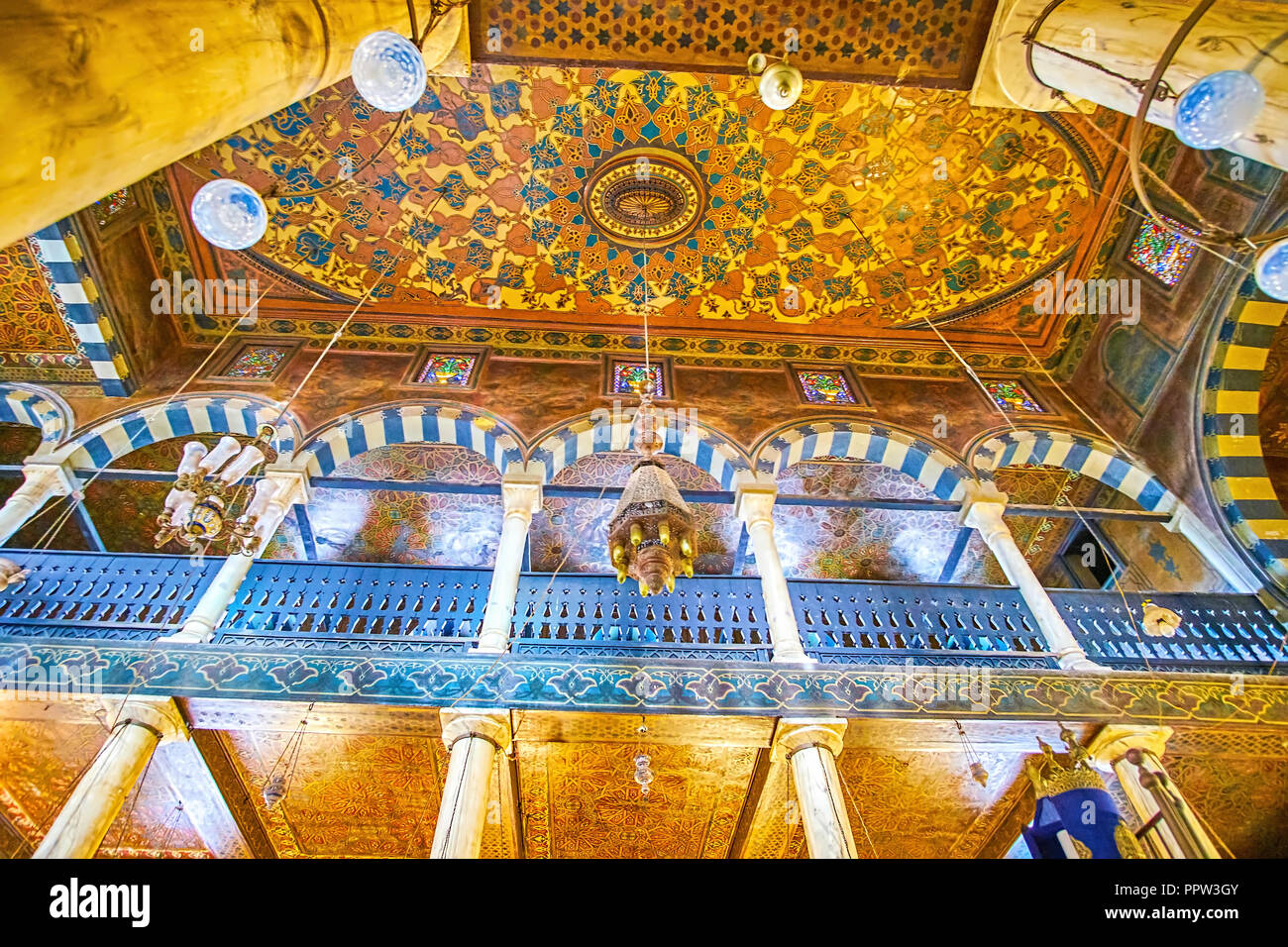 CAIRO, EGYPT - DECEMBER 23, 2017: The wooden ceiling of Ben Ezra Synagogue decorated with intricate patterns, and ottoman style arcades of the women p Stock Photo