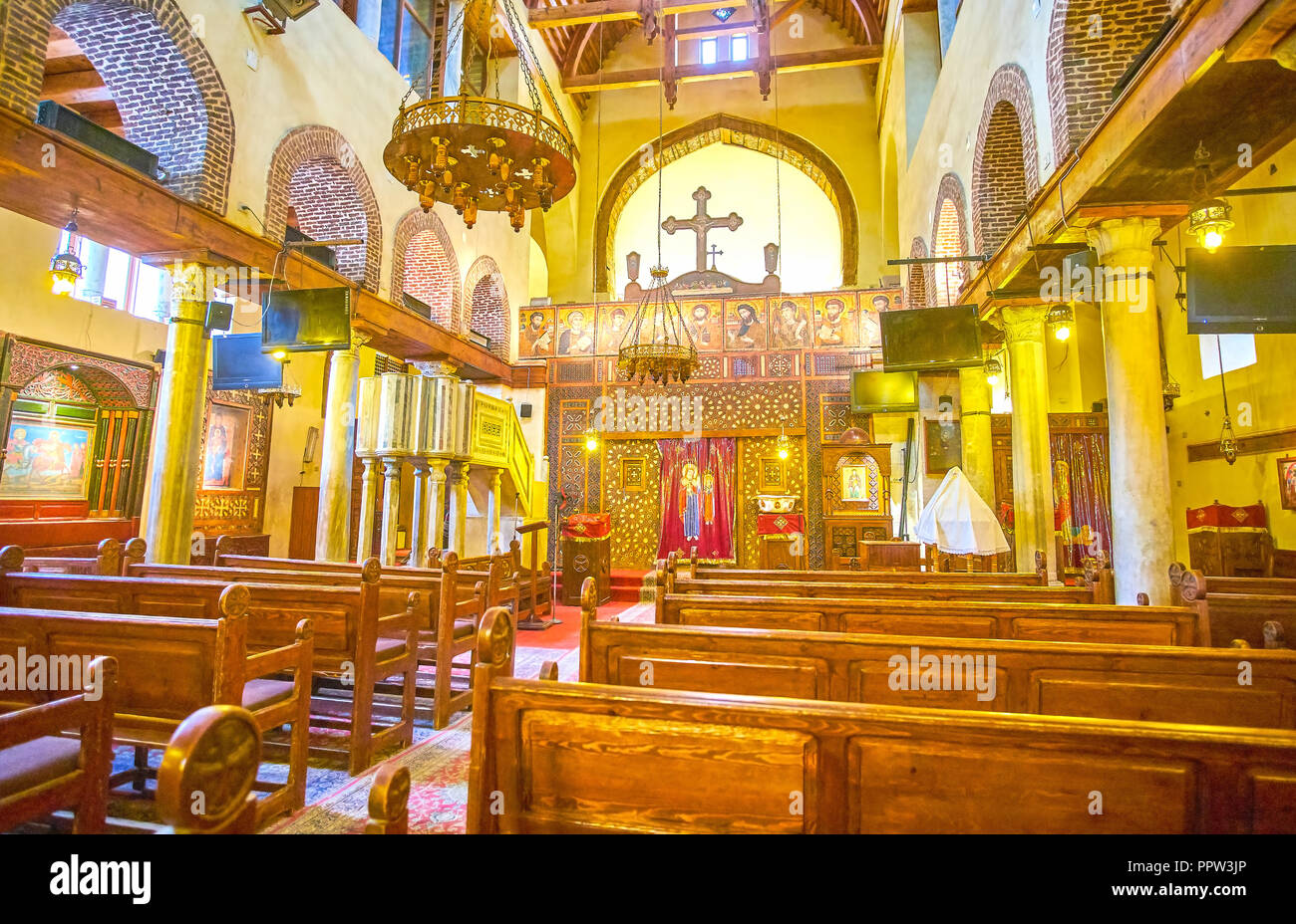 CAIRO, EGYPT - DECEMBER 23, 2017: The beautiful interior of the oldest Coptic St Sergius and Bacchus (Abu Serga) Church decorated with carved wooden i Stock Photo