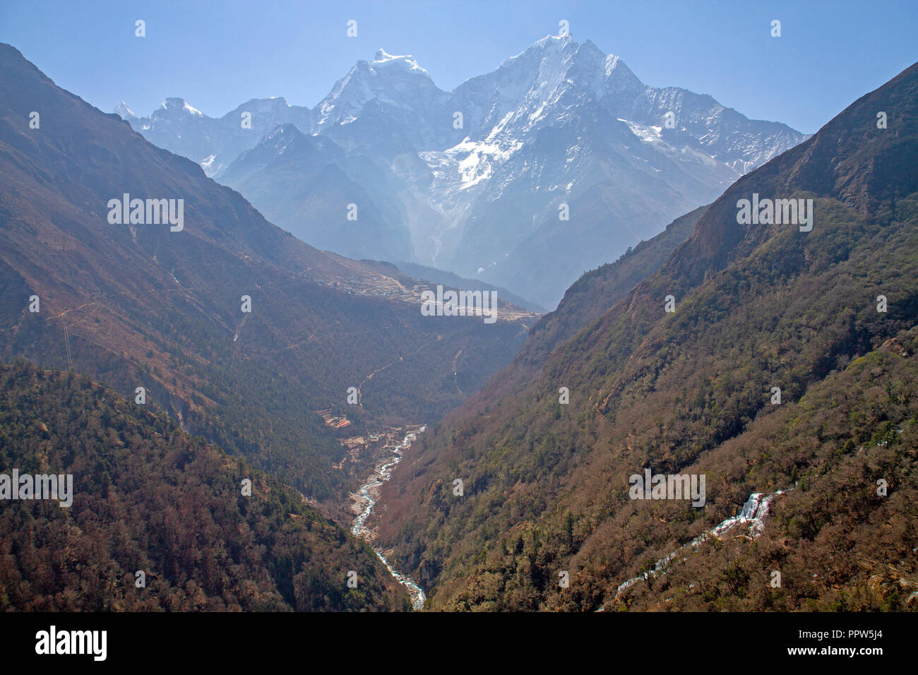View through the Gokyo valley to Phortse village and Thamserku mountain Stock Photo