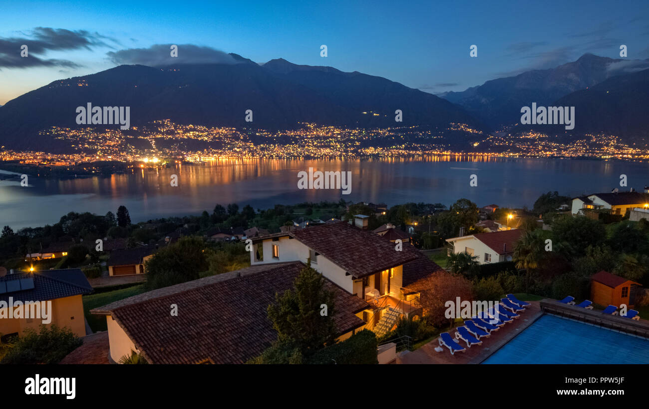 Lago Maggiore by night near Locarno (Ticino, Switzerland) after a sunny  October day Stock Photo - Alamy