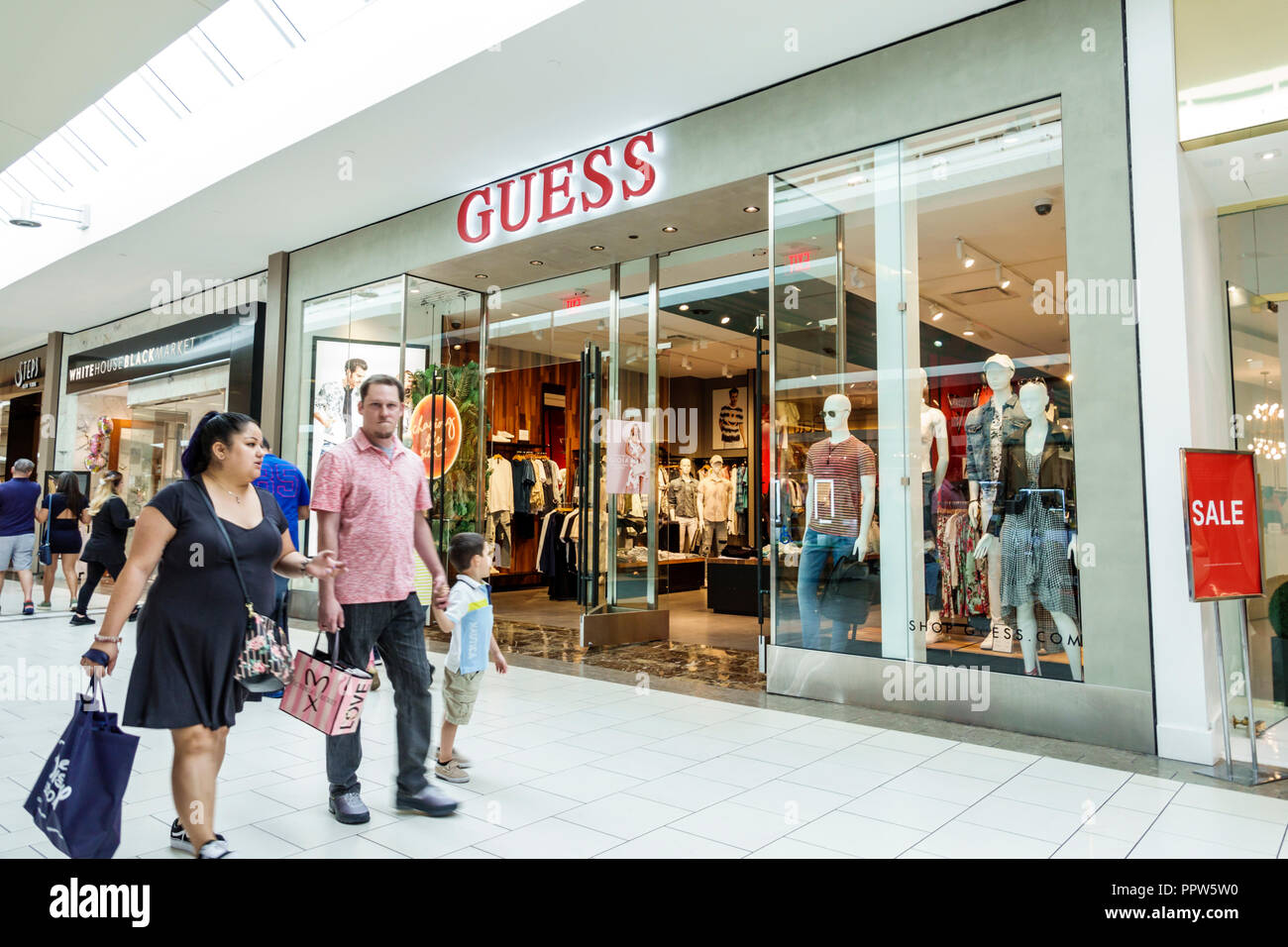 Florida, Miami, Kendall, Dadeland mall, Guess, clothing fashion store,  front entrance, family families parent parents child children, sightseeing  visi Stock Photo - Alamy