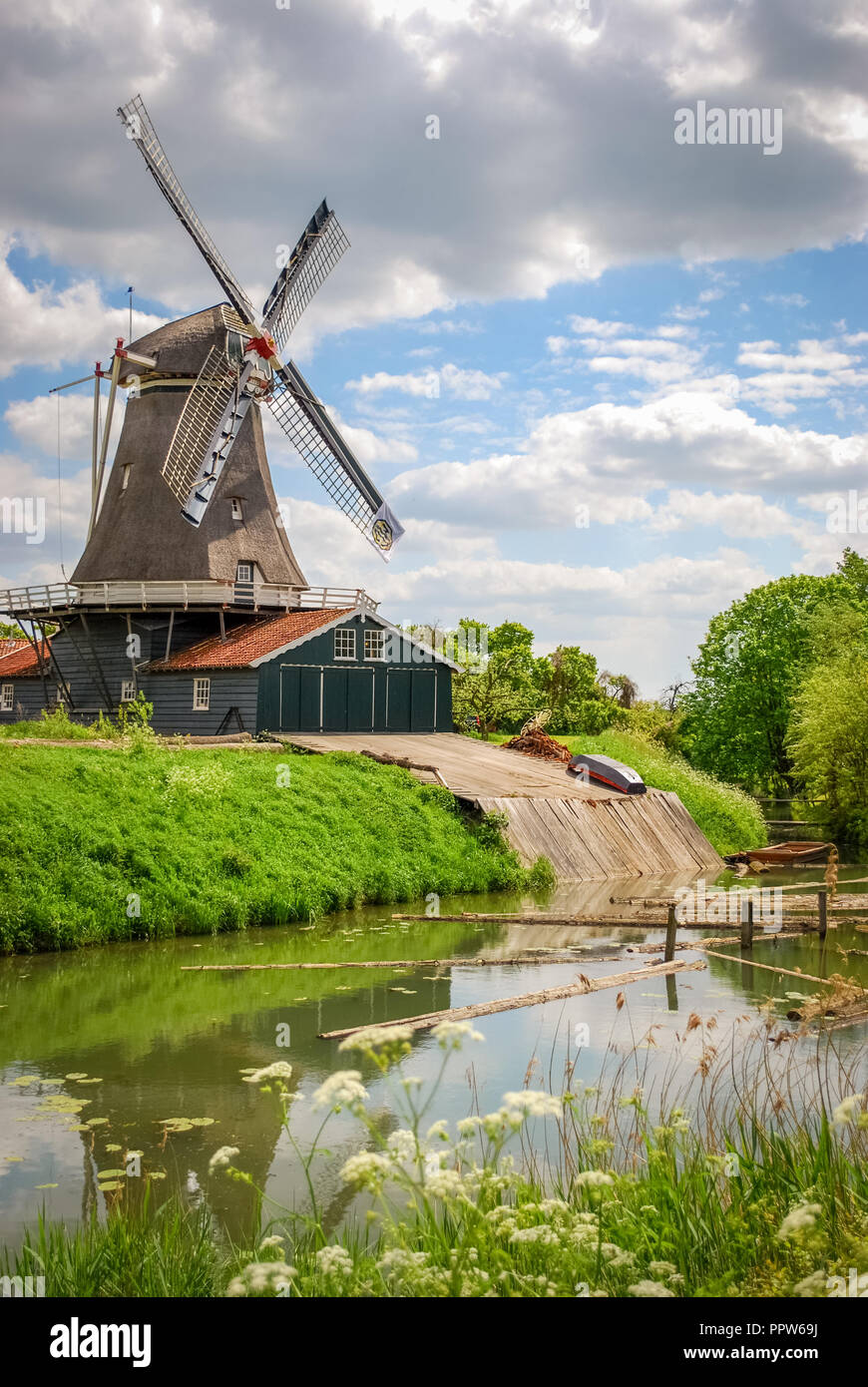 Mill near Deventer (The Netherlands). The city is largely situated on the east bank of the river IJssel and was once part of the Hanseatic league Stock Photo