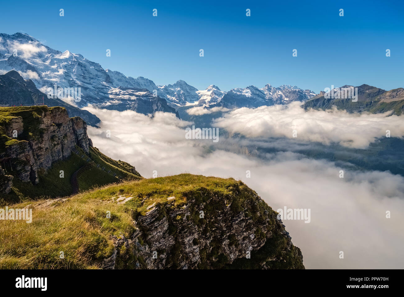 View from Mannlichen at the Bernese Alps (Berner Oberland, Switzerland). It is a mountain (2,343 metre) reachable from Wengen or Grindelwald Stock Photo