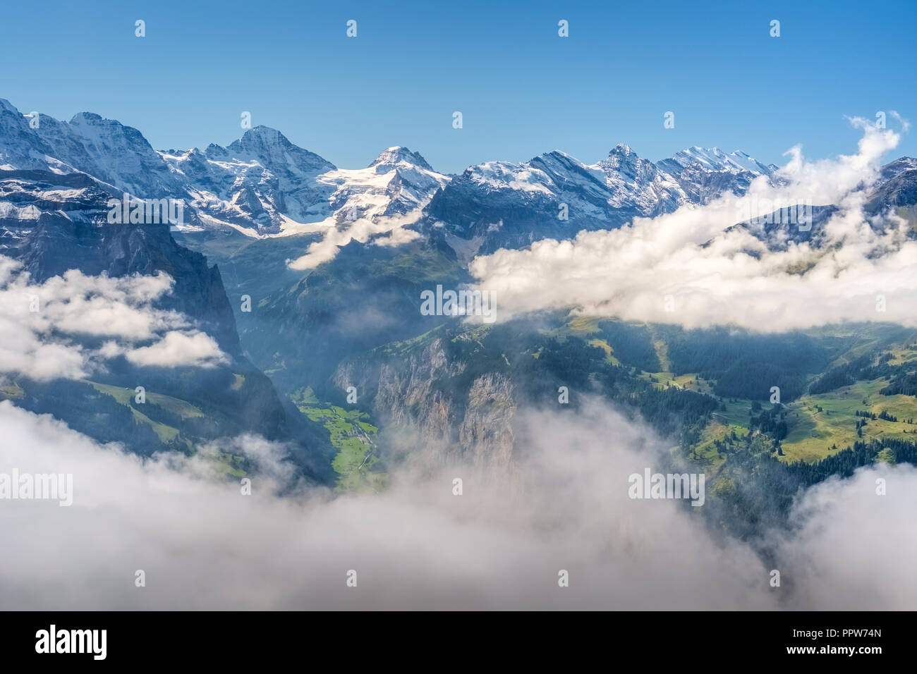 View from Mannlichen at the Bernese Alps (Berner Oberland, Switzerland). It is a mountain (2,343 metre) reachable from Wengen or Grindelwald Stock Photo