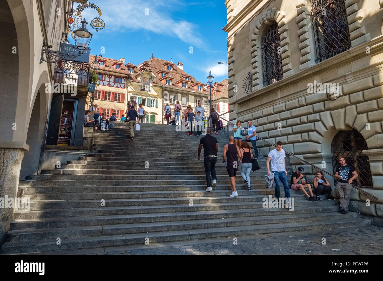 Lucerne, Switzerland – September 12, 2015: People are walking the stairs towards the City Hall (Rathaus) of Lucerne  a city in Central Switzerland Stock Photo