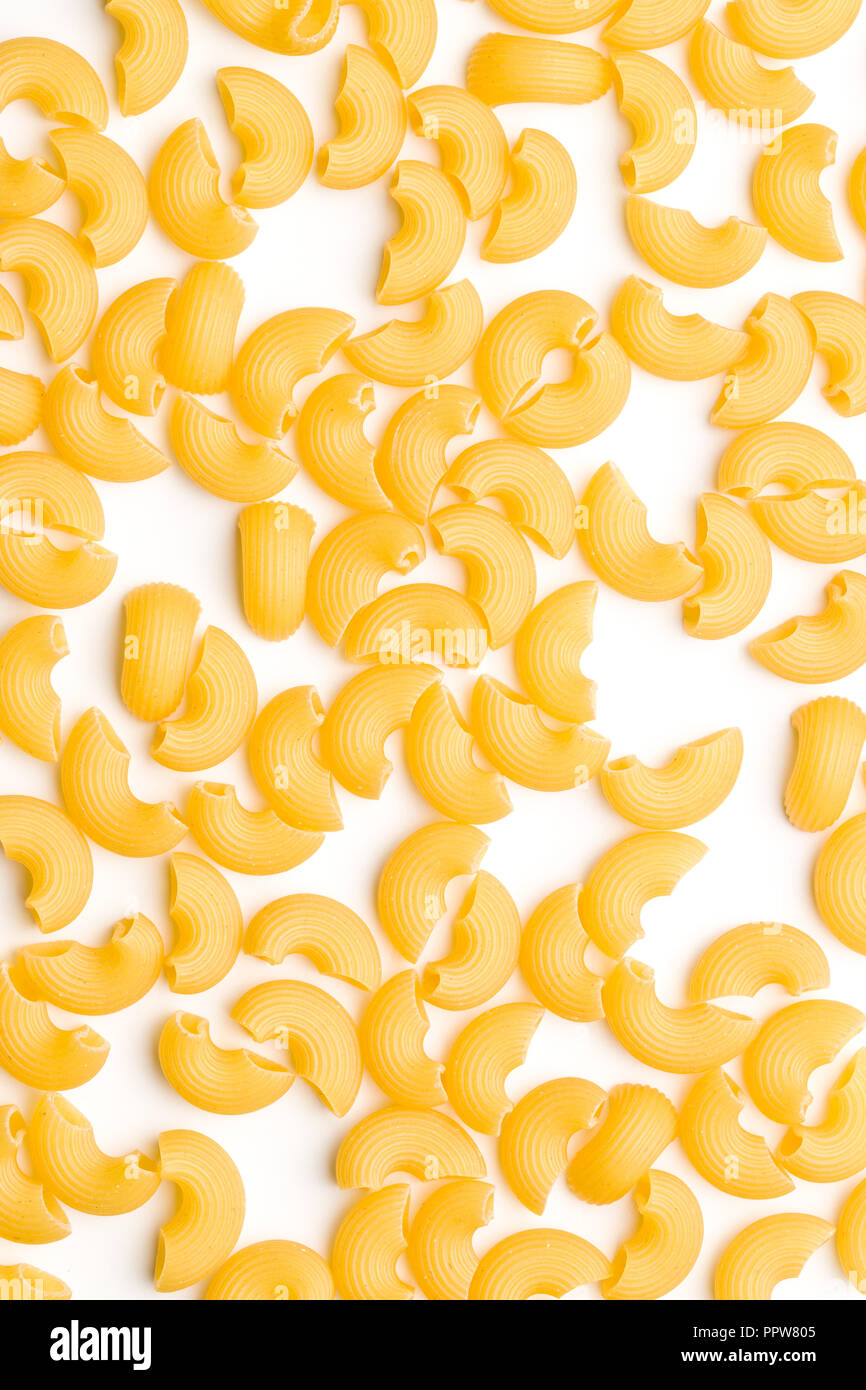 Uncooked elbow macaroni isolated on white background Stock Photo Alamy