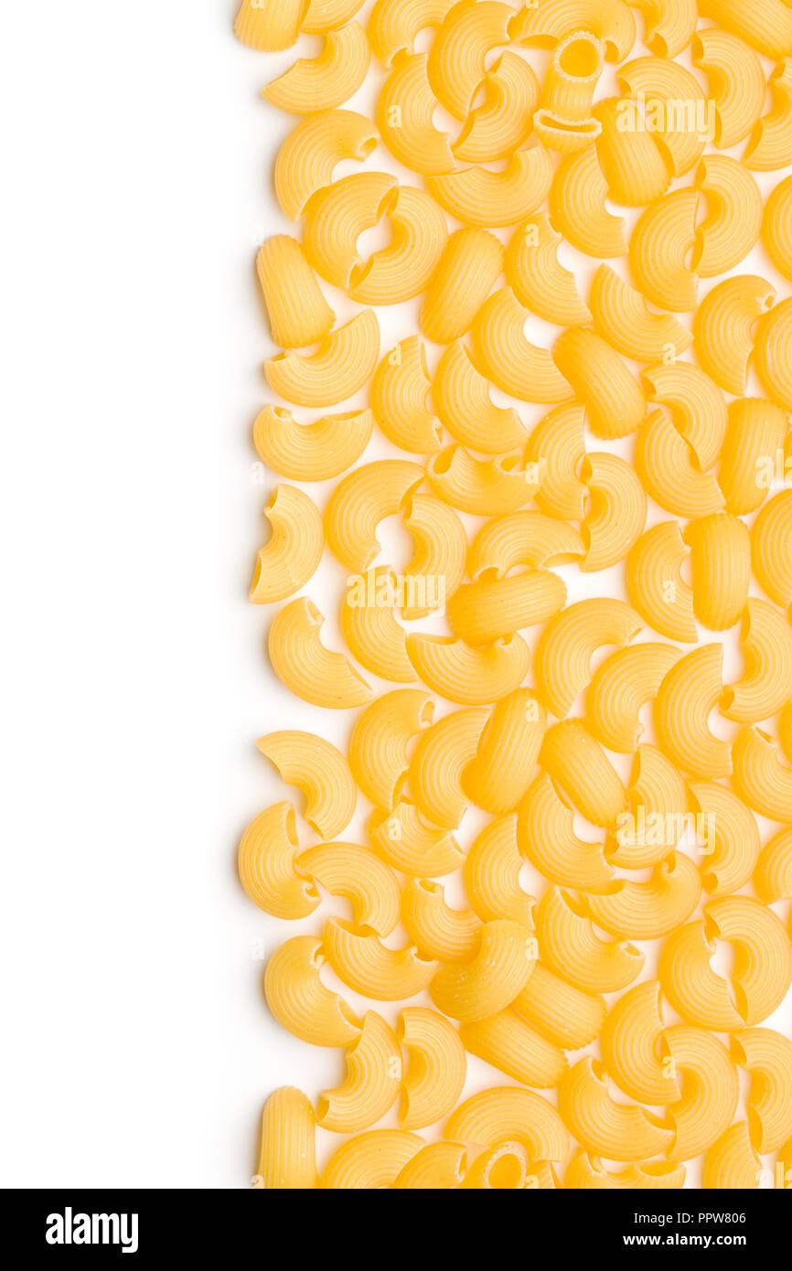 Uncooked elbow macaroni isolated on white background Stock Photo Alamy