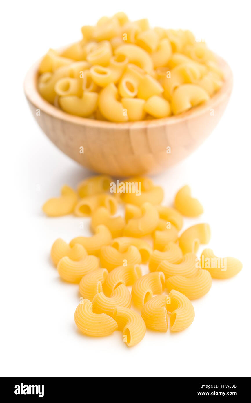 Uncooked elbow macaroni isolated on white background Stock Photo Alamy