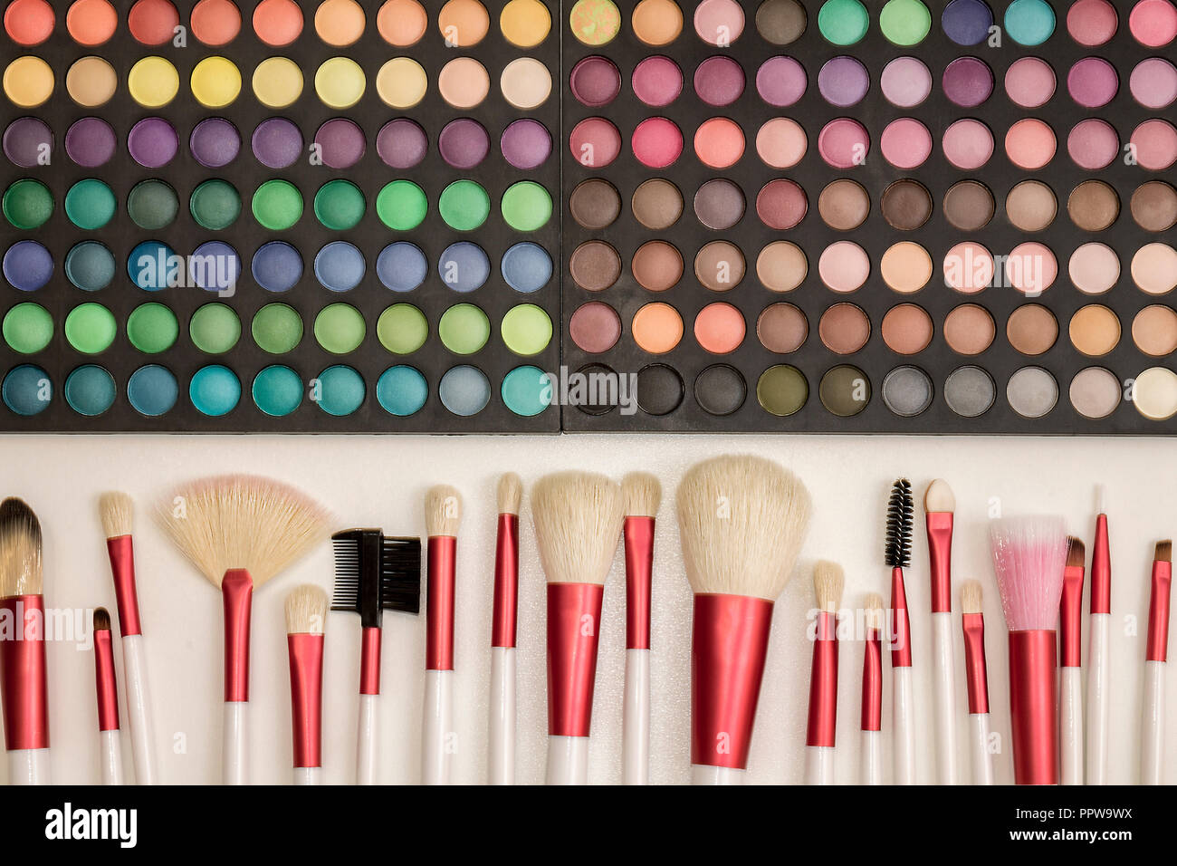 Colorful makeup set of eye shadows and brushes Stock Photo