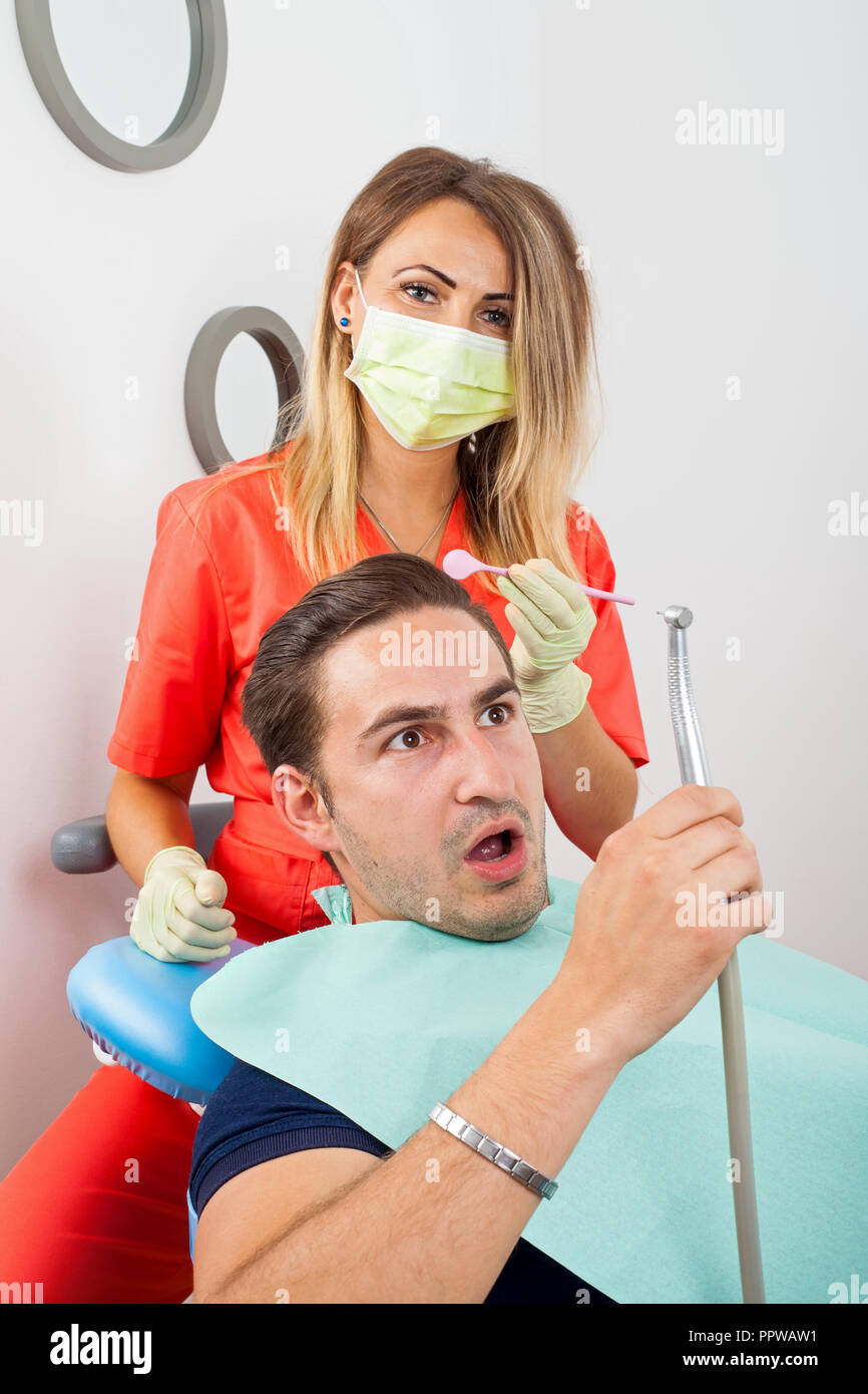 Photo of a stressful male patient at a dental clinic Stock Photo Alamy
