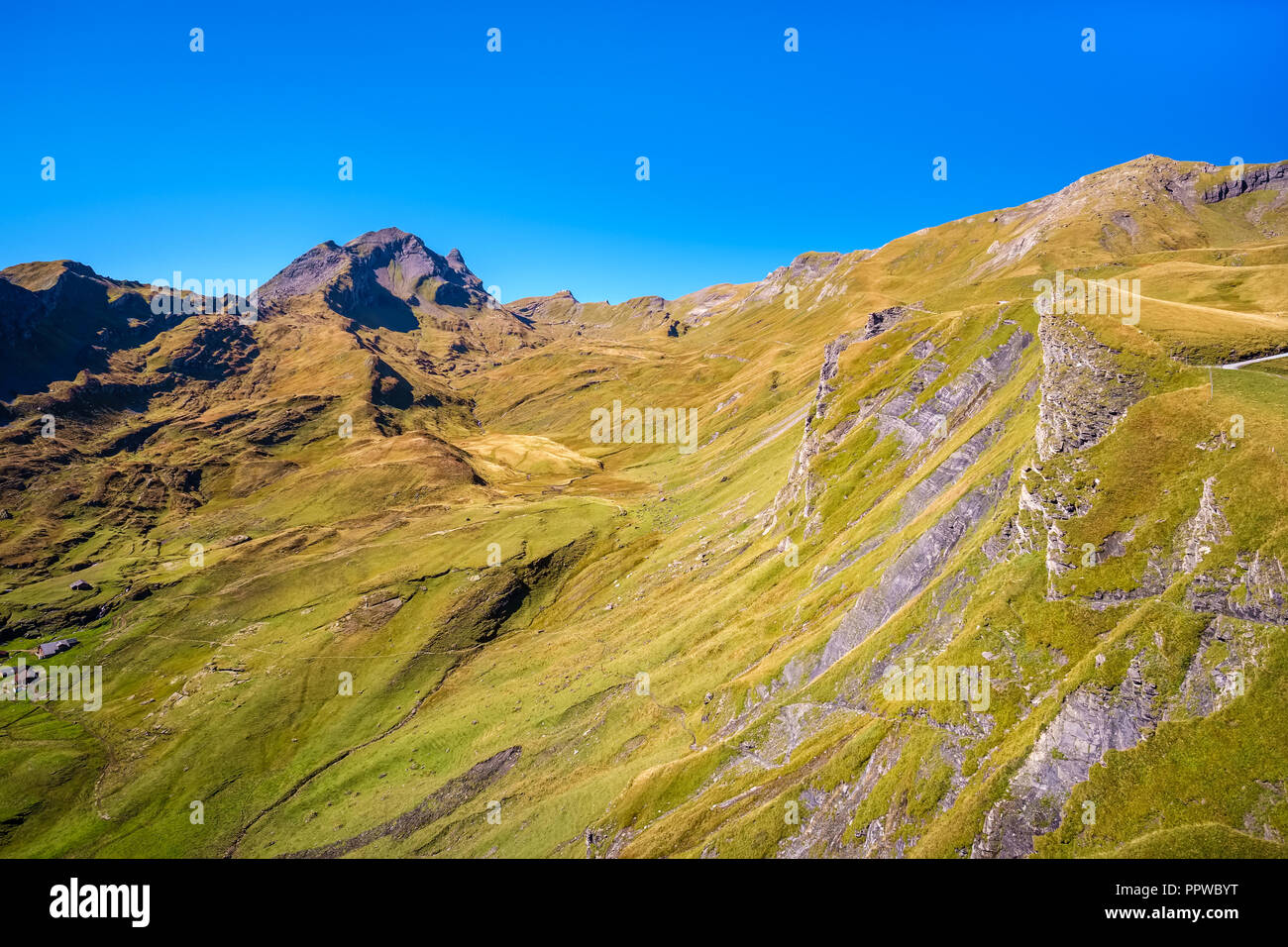 Gorgeous landscapes during the famous hiking trail from First to Grindelwald (Bernese Alps, Switzerland). Stock Photo