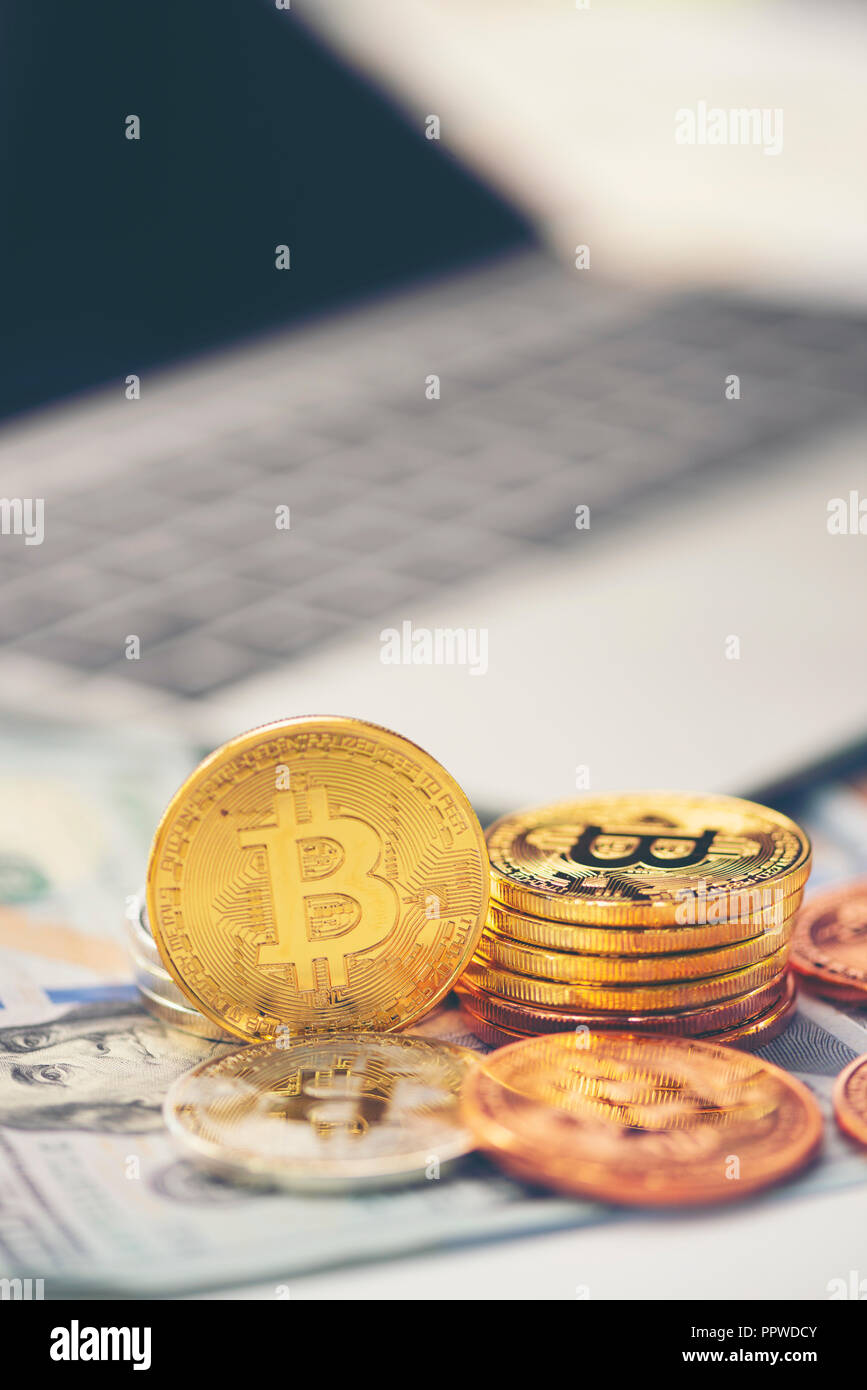 Concept image with physical coin of bitcoin crypto currency indicating of  price 9000 dollars for one bitcoin. Isolated white background Stock Photo -  Alamy