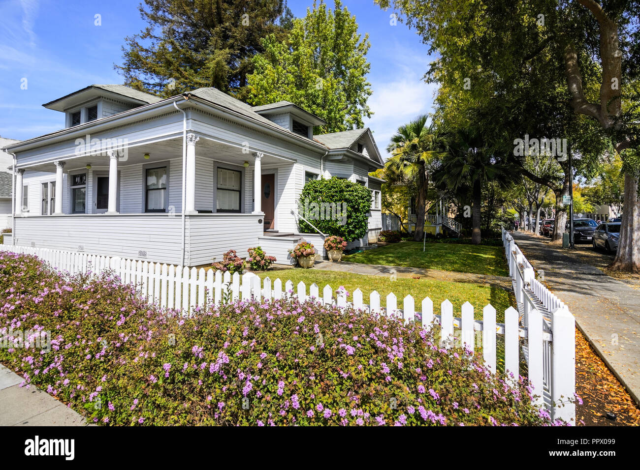 Exterior View Of Wooden House Surrounded By A White Fence In One Of The Residential Areas Of Palo Alto South San Francisco Bay Area Stock Photo Alamy