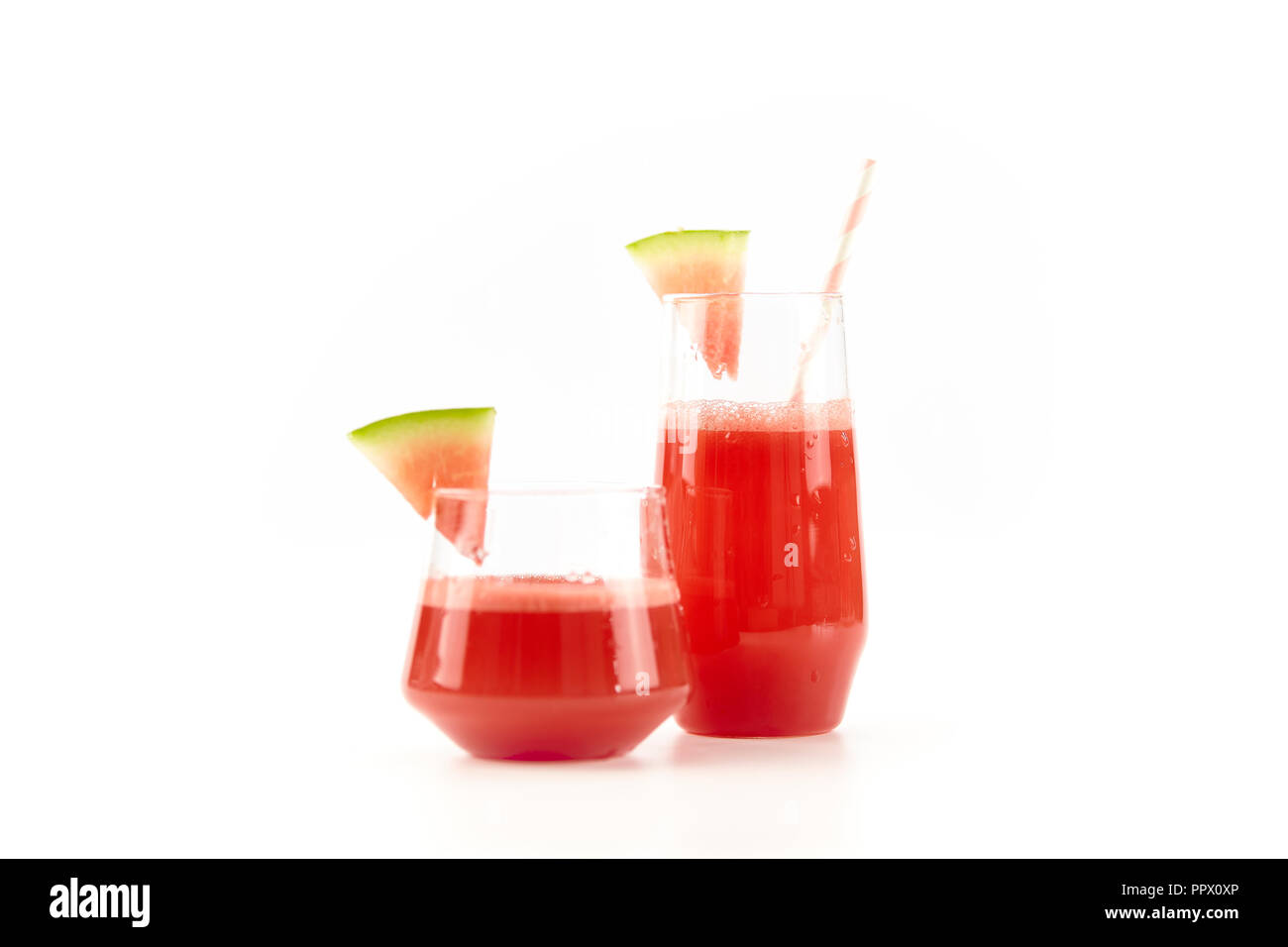 two glasses of water melon juice isolated on white background. Stock Photo