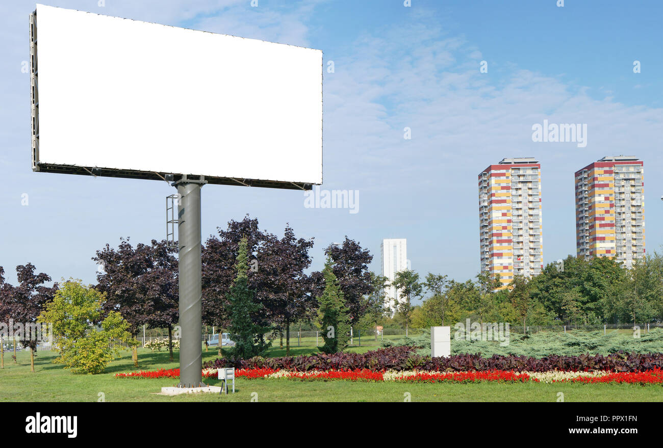 A modern large canvas blank billboard is installed in a standard