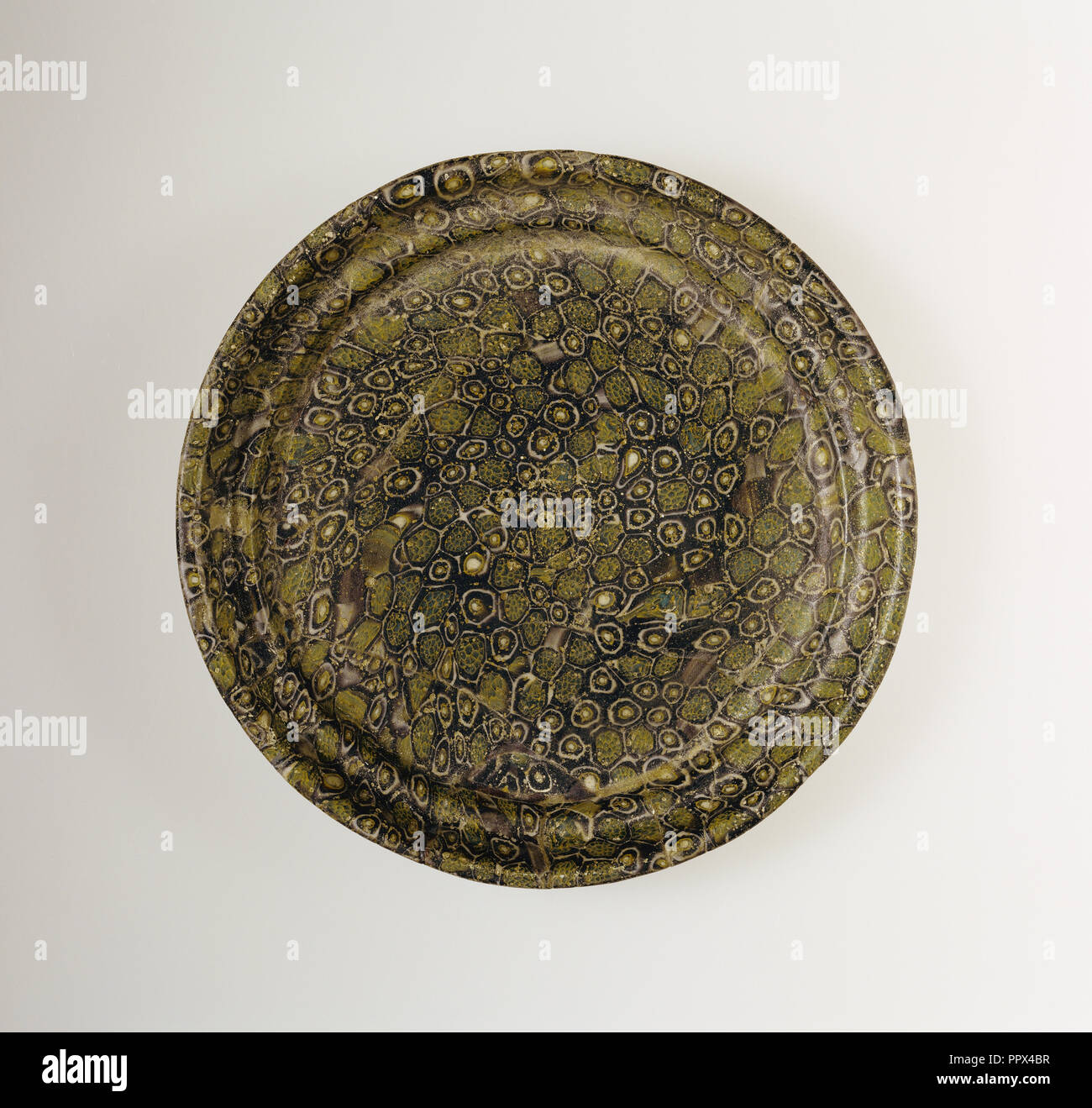 Dish with Flowers and Dots; Roman Empire; 1st century B.C. - 1st century A.D; Glass; 2.1 × 16 cm, 13,16 × 6 5,16 in Stock Photo