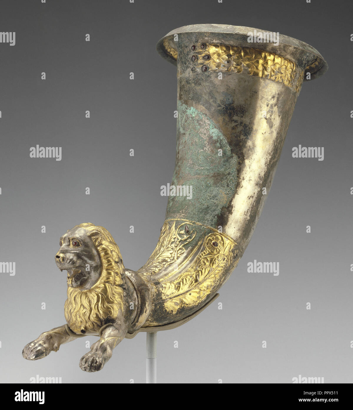 Lion-Shaped Spouted Horn; Eastern Parthian Empire; 1st century B.C; Gilt silver, stone, and garnets; 30.5 × 18.5 × 35.5 cm Stock Photo