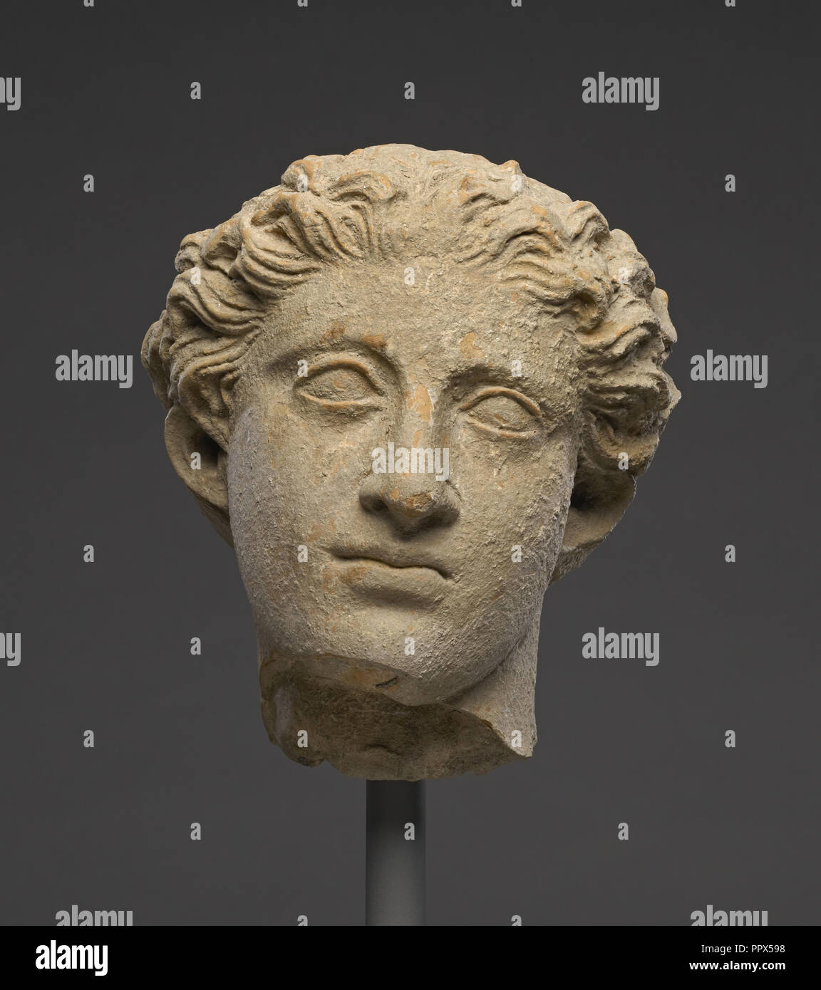 Head of a Youth; Tarentum, Taras, South Italy; 300 - 250 B.C; Terracotta; 16.5 × 13.1 cm, 6 1,2 × 5 3,16 in Stock Photo