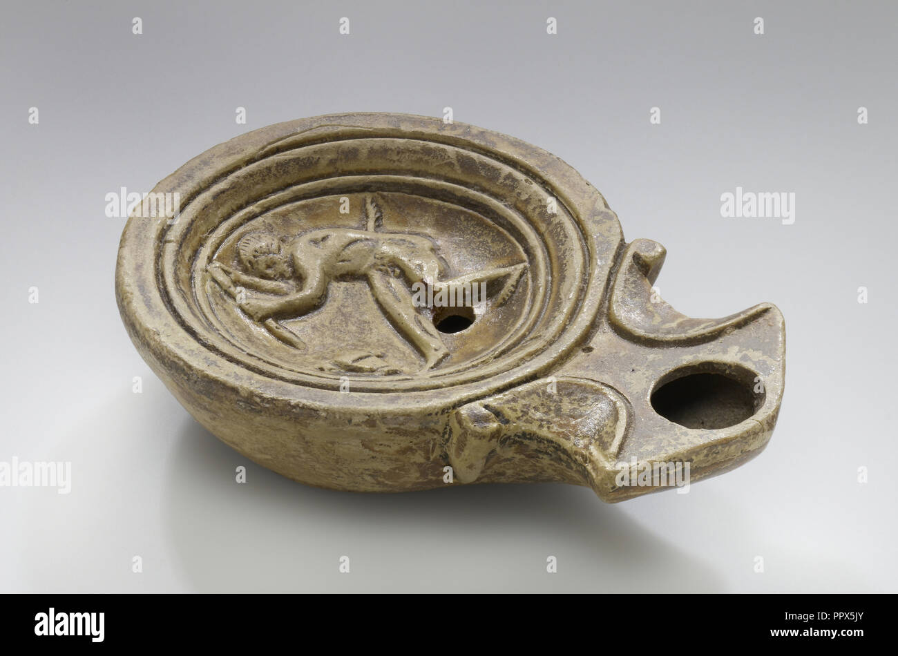 Lamp, North Africa; 1st - 4th century; Terracotta; 2.5 x 7 x 10 cm, 1 x 2 3,4 x 3 15,16 in Stock Photo