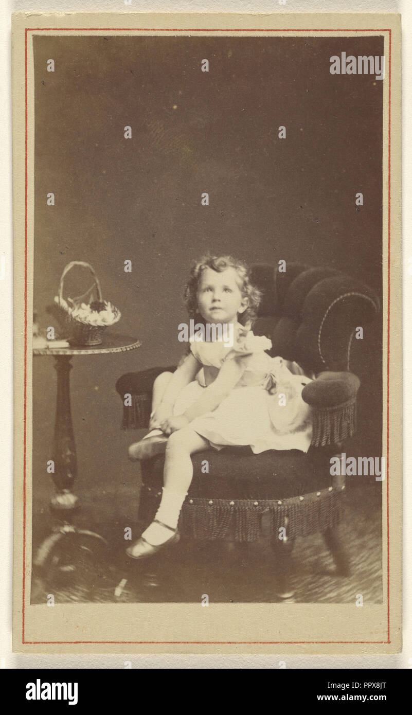 Little girl posed and seated; London Stereoscopic and Photographic Company; about 1873; Albumen silver print Stock Photo