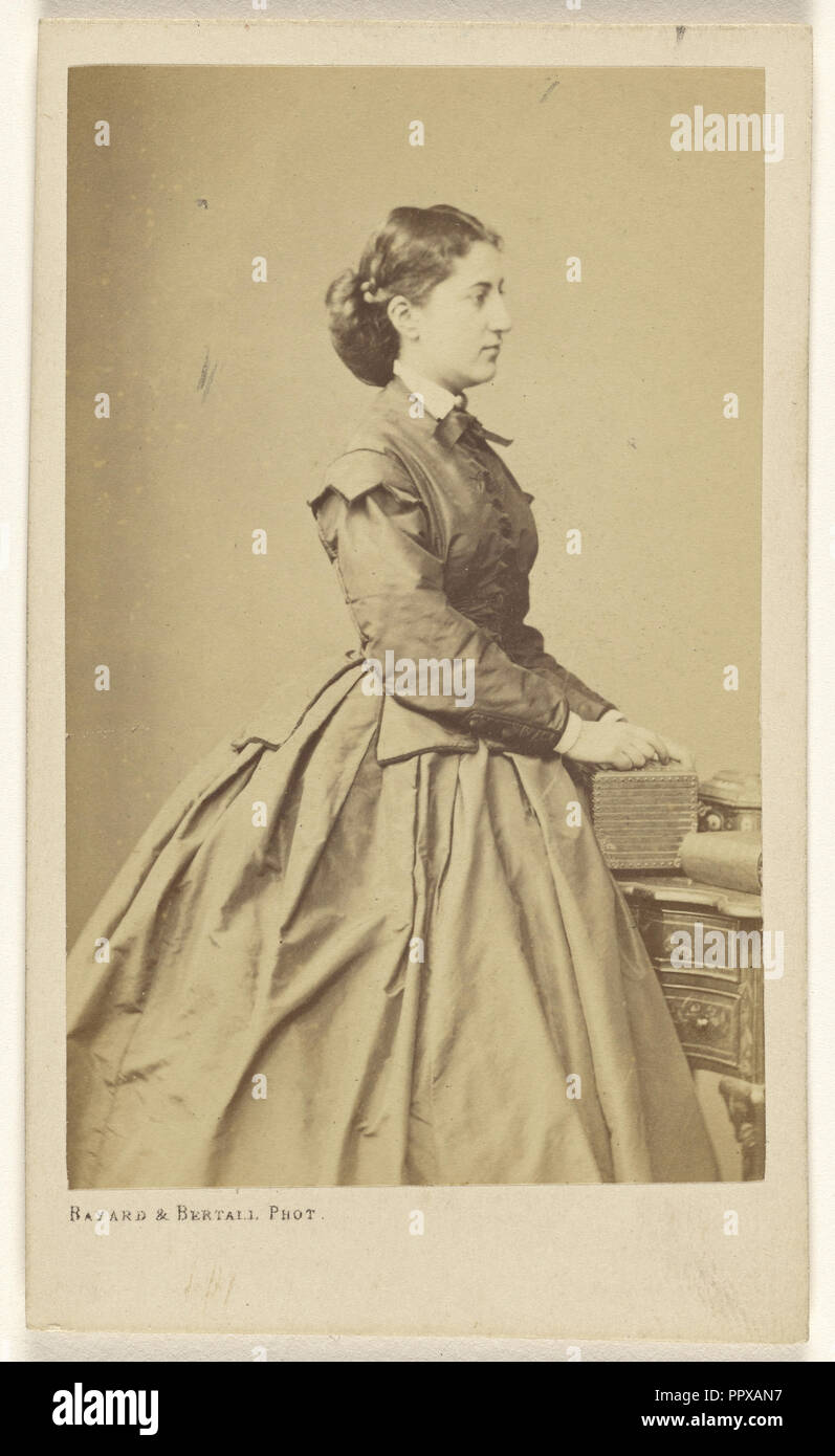 French woman in profile, standing; Bayard & Bertall; about 1862; Albumen silver print Stock Photo