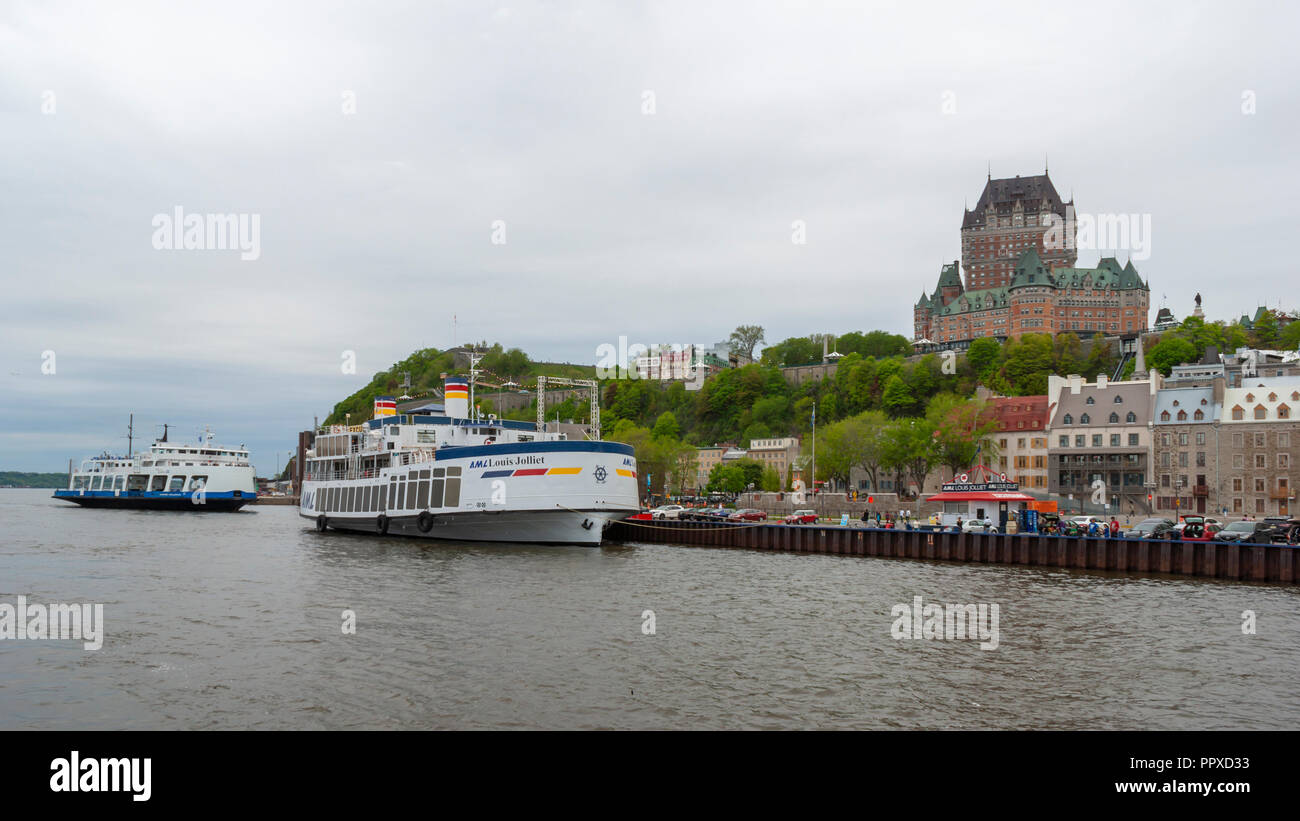 Ferry and cruise ship on St. Lawrence River. The Château Frontenac
