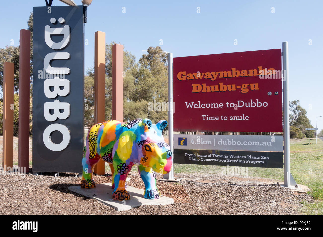 Town sign for Dubbo NSW Australia with colourful rhino to advertise their famous zoo, Stock Photo