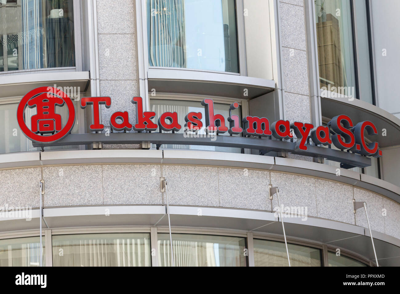 a-signboard-of-takashimaya-department-store-on-display-outside-its-new