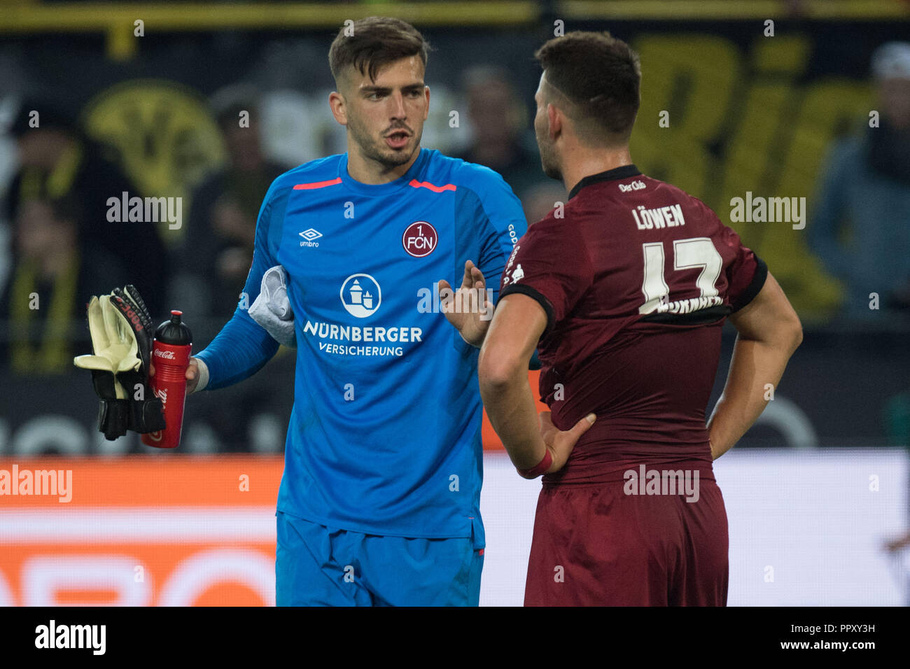 Dortmund, Deutschland. 27th Sep, 2018. Eduard LOEWEN (right, Lv? Wen, N) and goalkeeper Fabian BREDLOW (N) talking after the final whistle witheinander, frustratedriert, frustrated, verbatized, disappointed, disappointed, disappointment, disappointment, sad, half figure, half figure, gesture, gesture, Soccer 1. Bundesliga, 5. matchday, Borussia Dortmund (DO) - FC Nuremberg (N) 7: 0, on 26/09/2018 in Dortmund/Germany. ¬ | usage worldwide Credit: dpa/Alamy Live News Stock Photo