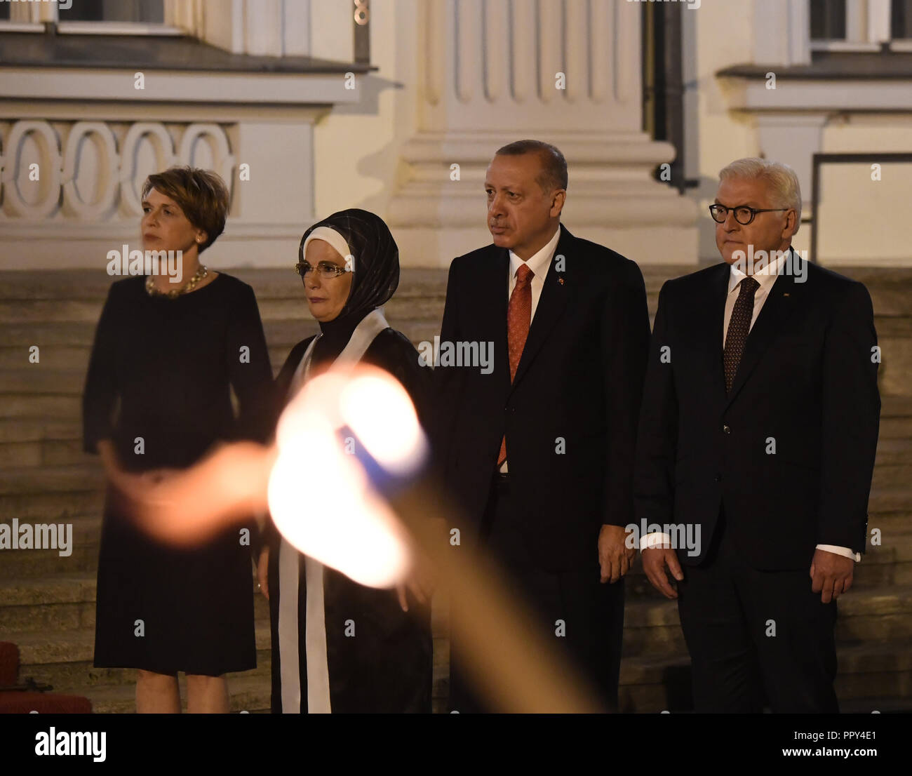 28 September 2018, International, Berlin: German President Frank-Walter Steinmeier (right to left), Recep Tayyip Erdogan, President of Turkey, his wife Emine and Elke Buedenbender, President Steinmeier's wife, welcoming the guests ahead of a state banquet at Bellevue Palace. Photo: Ralf Hirschberger/dpa Stock Photo