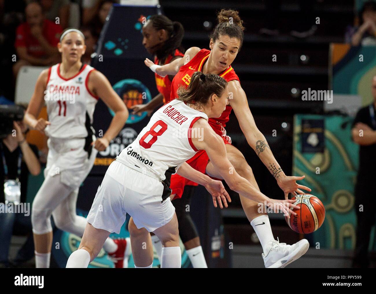 Spain's National Women's basketball team player Laura Nicholls in action  against Canada's Kim Gaucher, during their 2018 FIBA Women's Basketball  World Cup quarter finals match in Tenerife, Canary Islands, Spain, 28  September