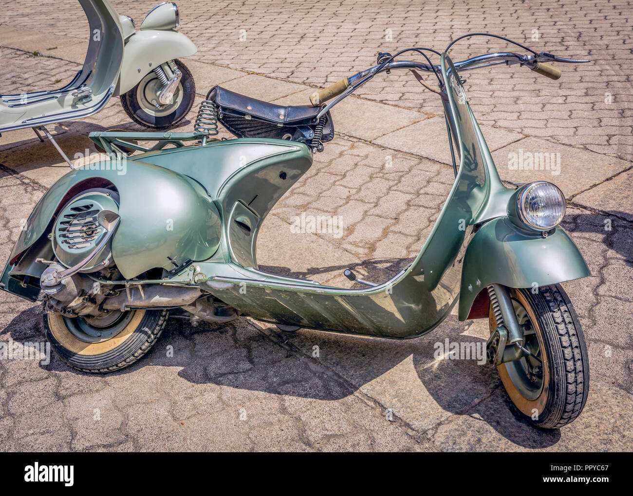 Cagliari, Italy - April 29, 2018: Piaggio Vespa vintage scooters meeting.  Vintage Vespa from the 50s. Post process in vintage styl Stock Photo - Alamy