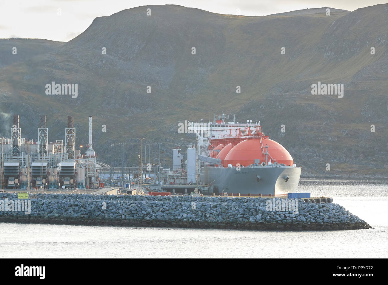 The Giant LNG (Liquified Natural Gas) Carrier, ARCTIC VOYAGER, Loading At The Melkøya LNG Processing Facility, Hammerfest, Norway. Stock Photo