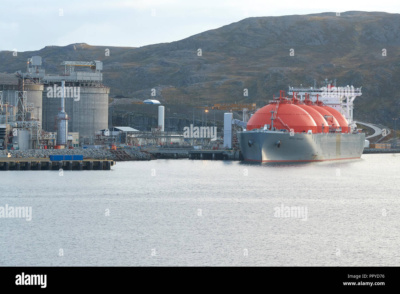 The Giant LNG (Liquified Natural Gas) Carrier, ARCTIC VOYAGER, Loading At The Melkøya LNG Processing Facility, Hammerfest, Norway. Stock Photo