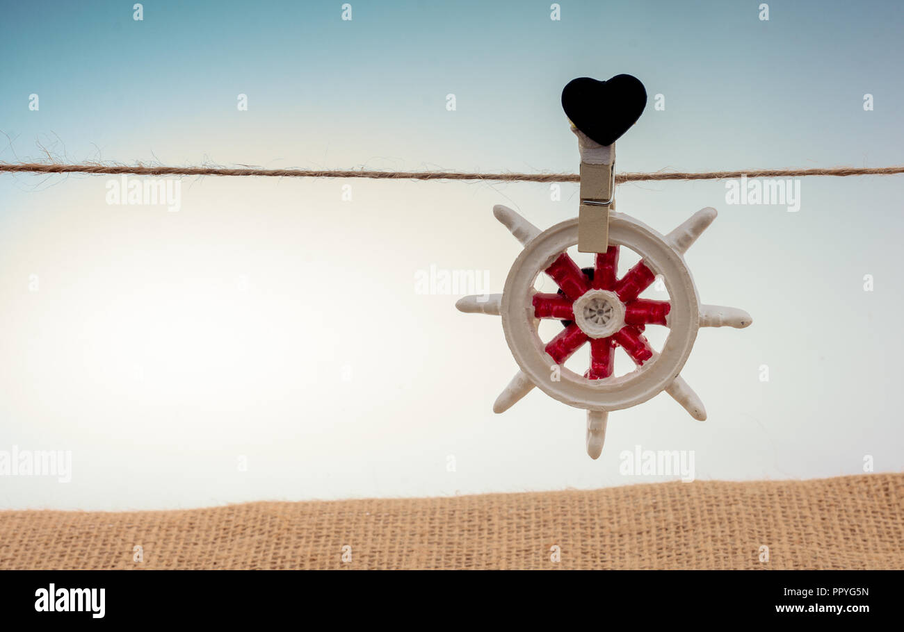 Steering wheel attached to a string Stock Photo Alamy