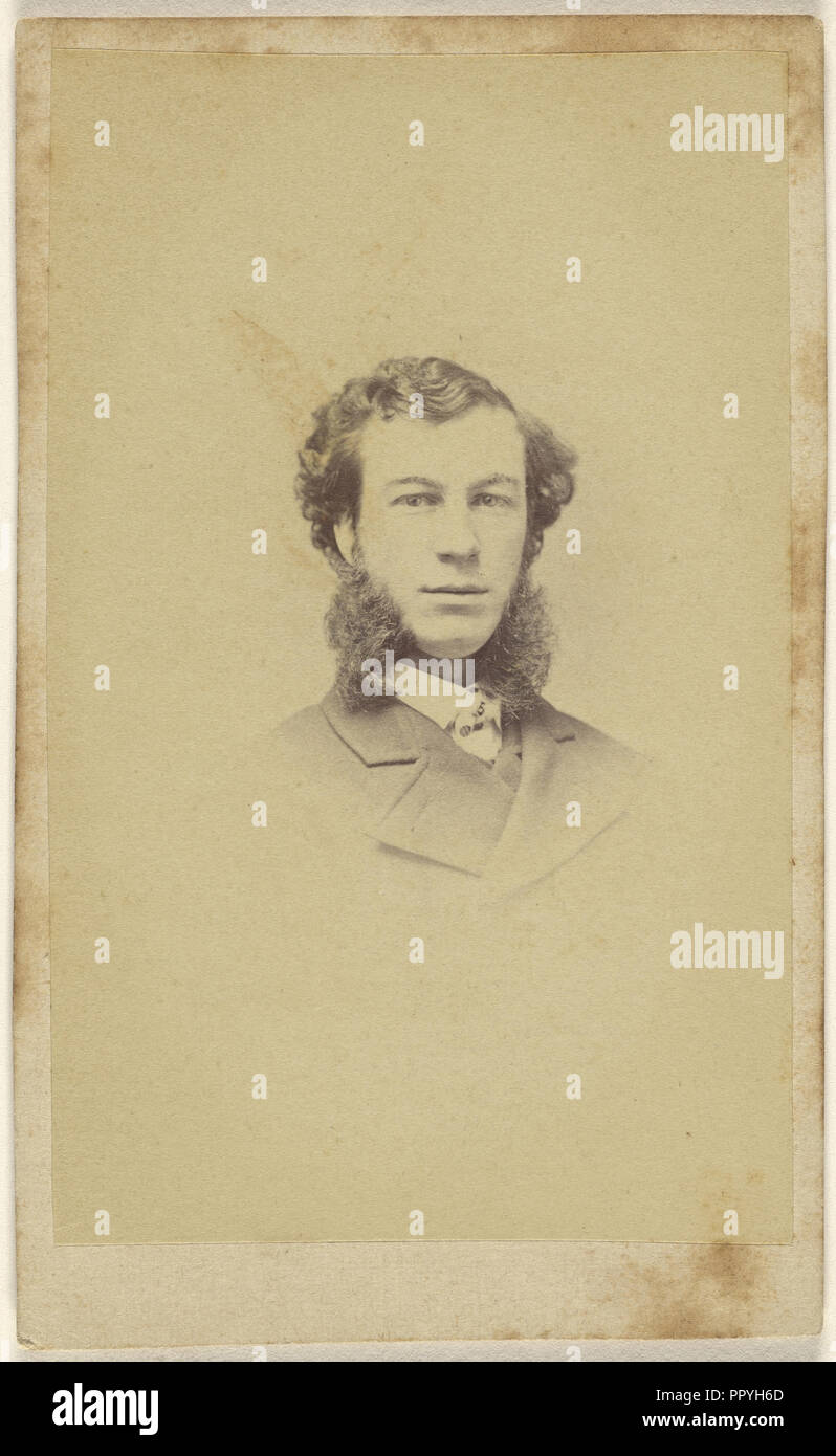 man with extremely long muttonchops, printed in vignette-style; 1865-1870; Albumen silver print Stock Photo