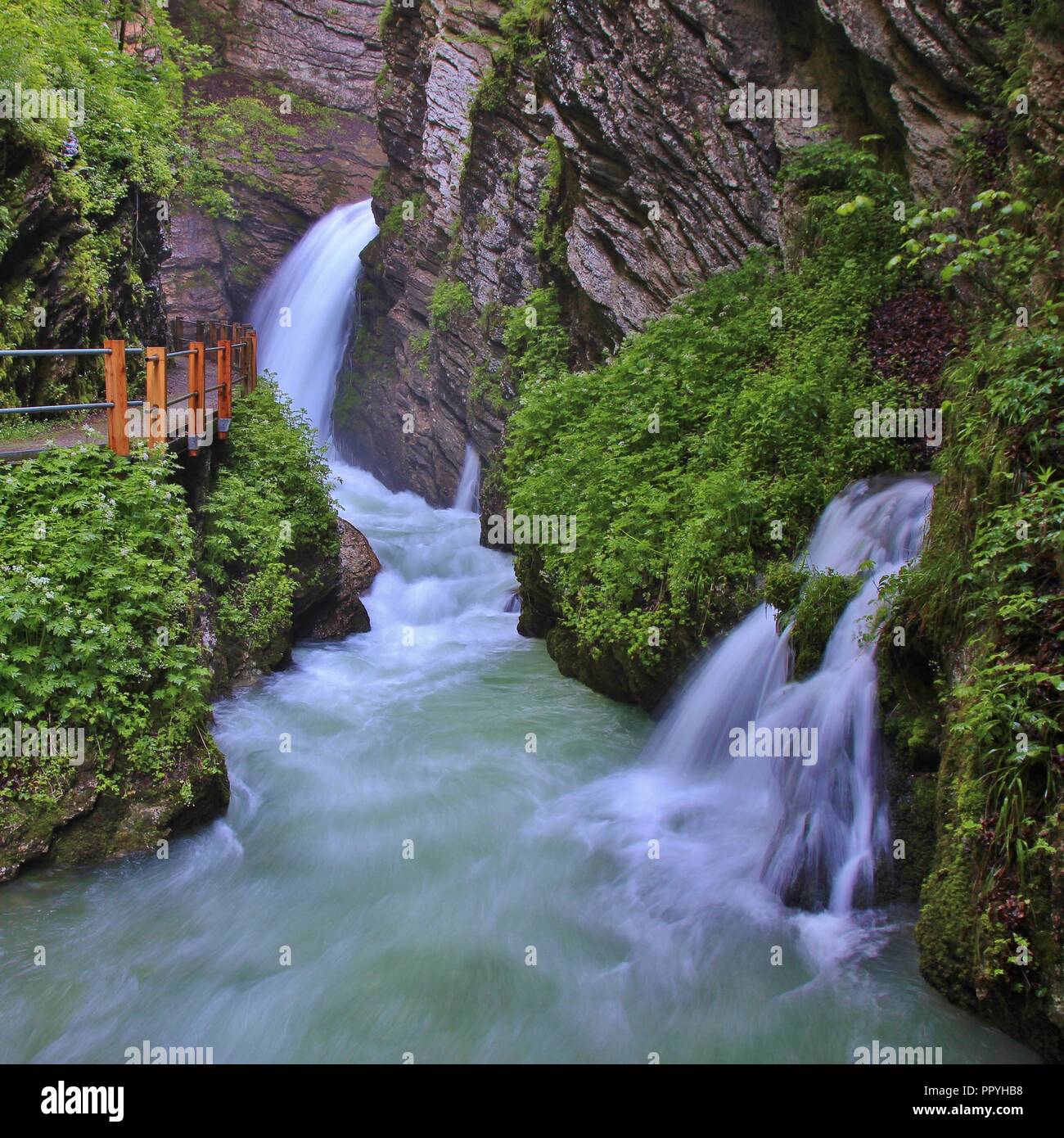Waterfalls in Unterwasser, Toggenburg valley. Spring scene in the Swiss Alps. Thurfaelle. Stock Photo