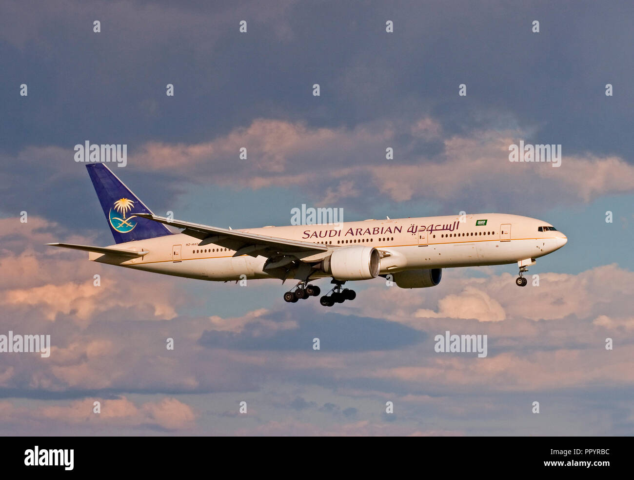 Saudi Arabian Airlines Boeing 777-268ER landing at London Stansted airport. Stock Photo