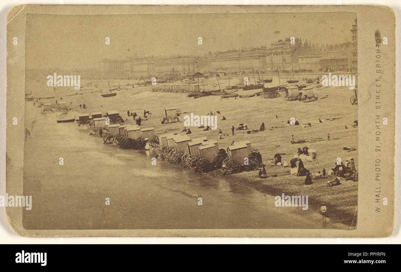 Beach scene showing bathing cabinets at shoreline, Brighton, England; W. Hall, British, active 1865 - 1890, about 1870; Albumen Stock Photo