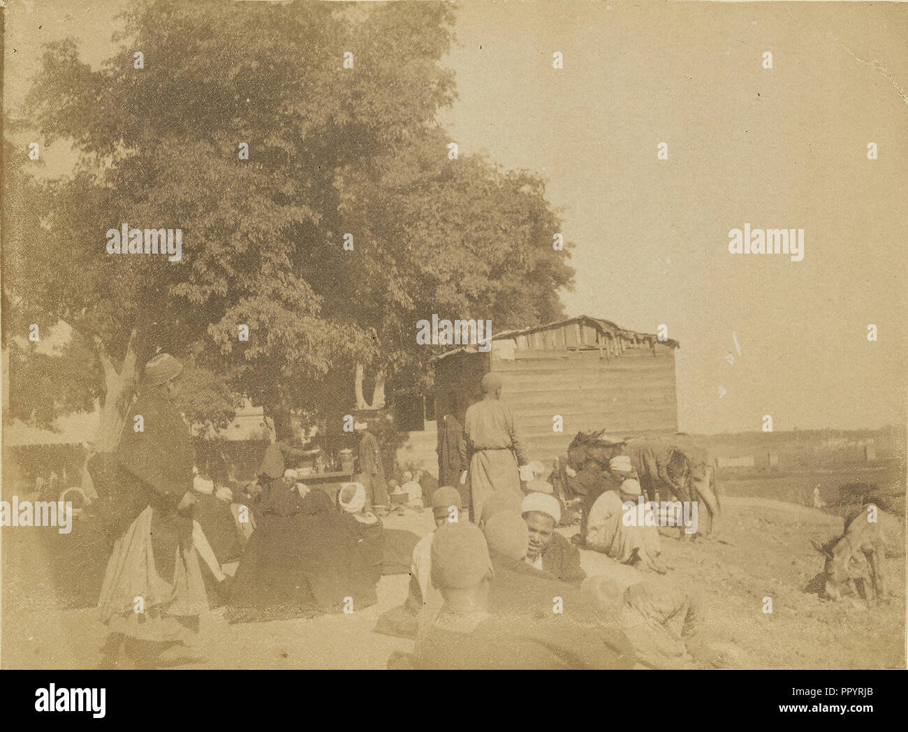 People gathered outdoors; about 1860 - 1880; Tinted Albumen silver print Stock Photo