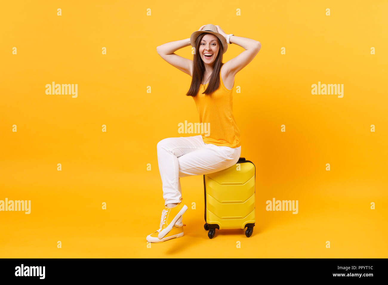 Traveler woman sit on suitcase hires stock photography and images Alamy