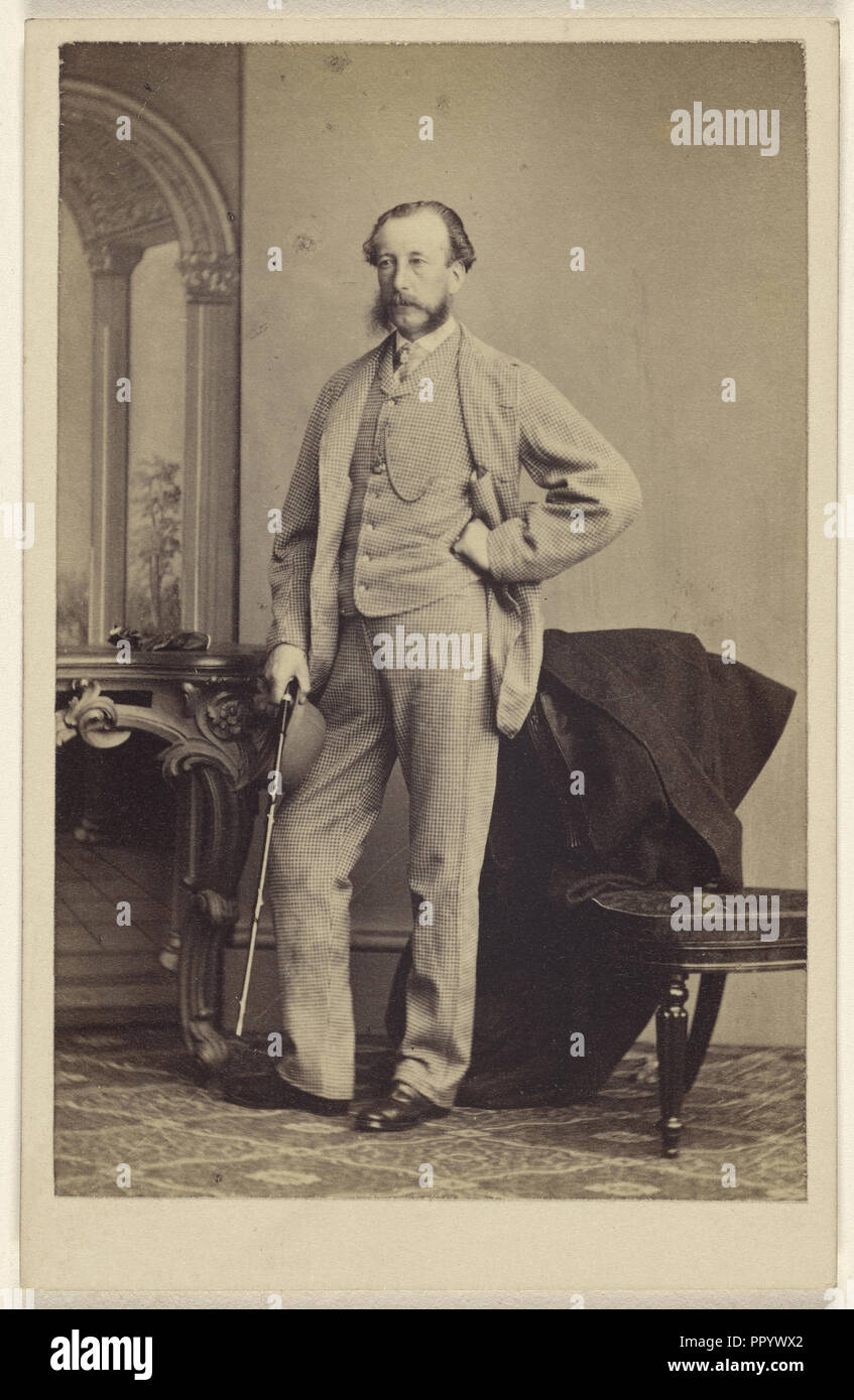 bearded man standing, holding a walking stick; Thomas Rodger, Scottish, 1832 - 1883, 1865 - 1870; Albumen silver print Stock Photo