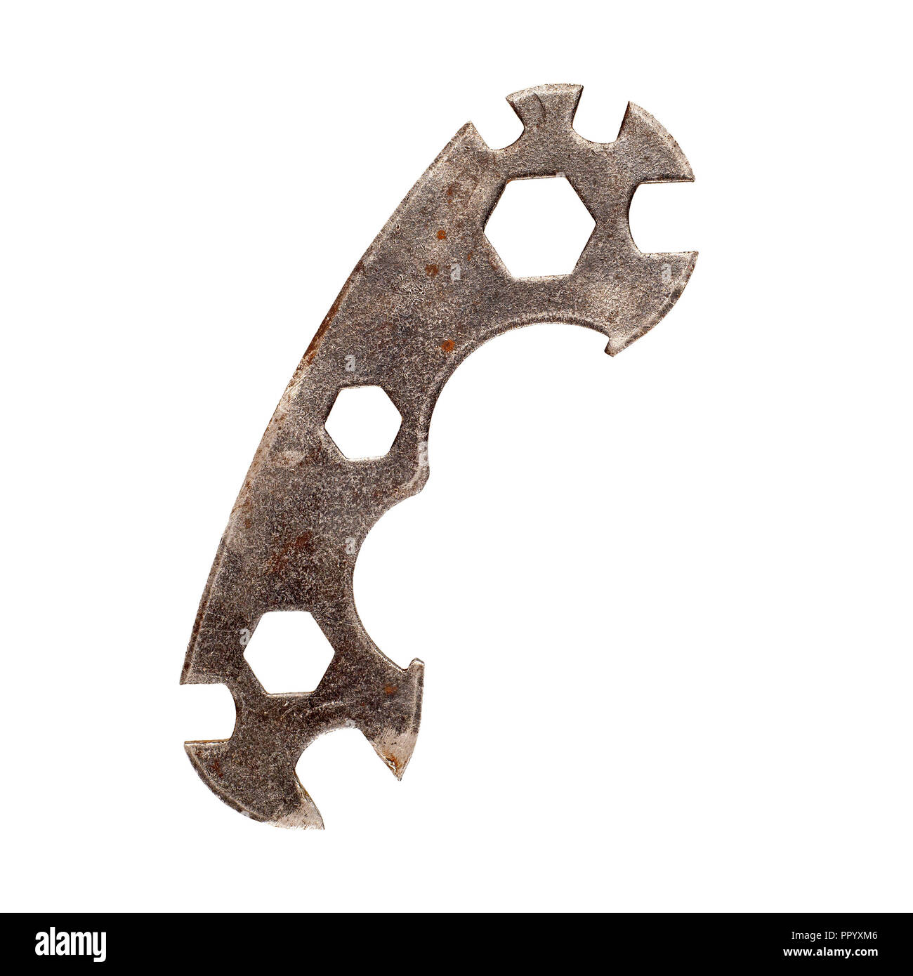 Old rusty multi function bicycle wrench hexagon isolated on white background Stock Photo