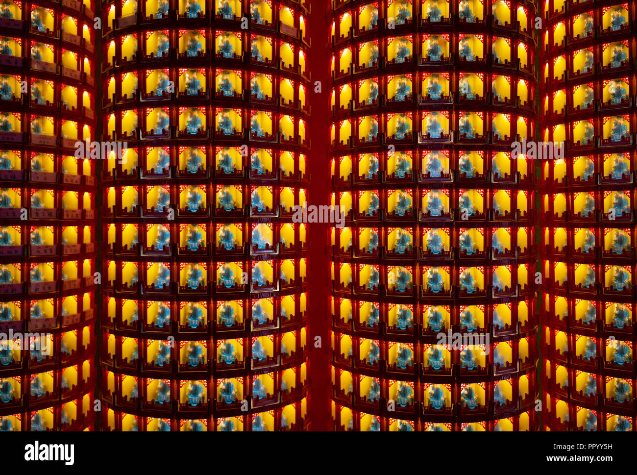 Caishen lights god of wealth in a Taoist temple in Kaohsiung Taiwan Stock Photo