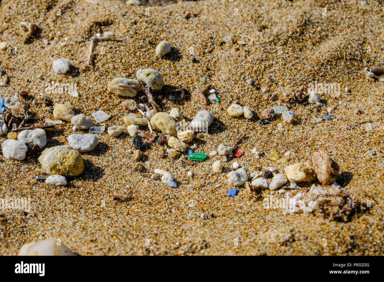 Plastic pollution is a huge problem all around the world. We can find plastic materials, garbage and every kind of trash almost on every beach all aro Stock Photo