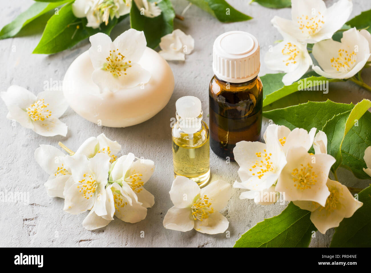 Jasmine oil. Aromatherapy with Jasmine oil and soap. Jasmine flower