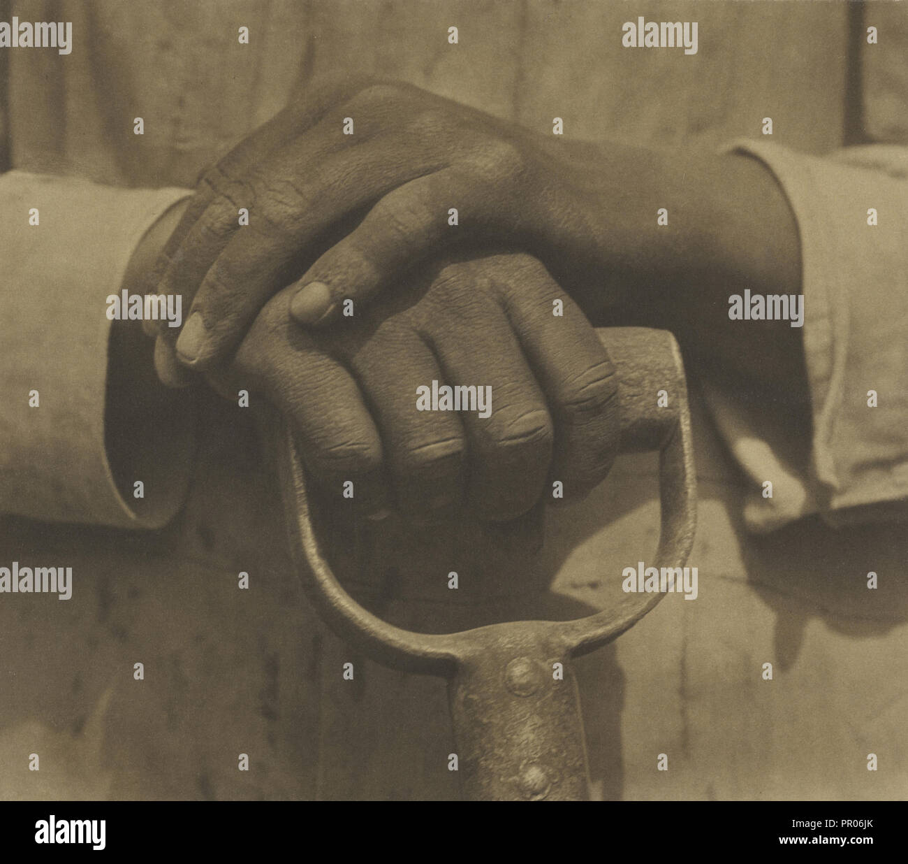 Hands Resting on Tool; Tina Modotti, American, born Italy, 1896 - 1942, Mexico; 1927; Palladium print; 19.7 x 21.6 cm Stock Photo