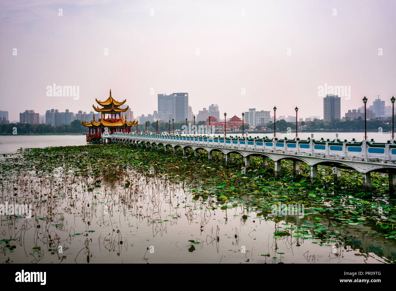 Side view of Spring and autumn pavilions at lotus pond lake in Kaohsiung Taiwan Stock Photo