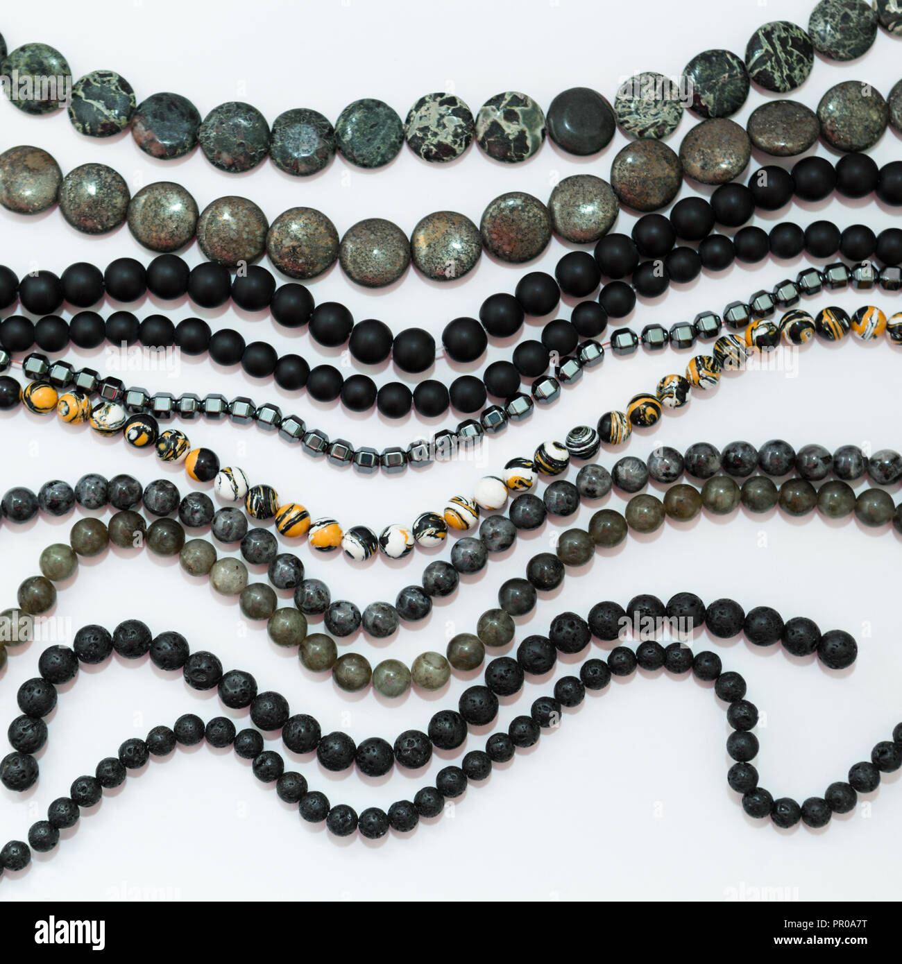 Set of different dark colors gemstones beads Stock Photo