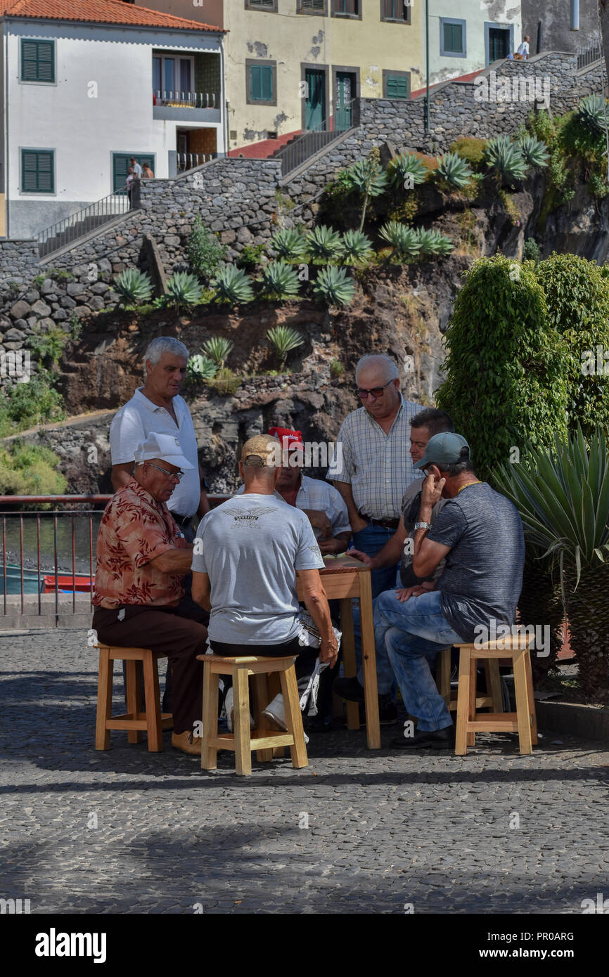 Old man play cards Stock Photo